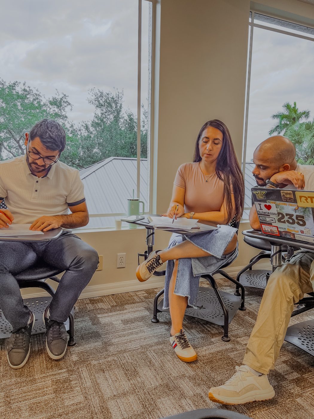Students studying at desks in an Antares Fort Myers classroom.