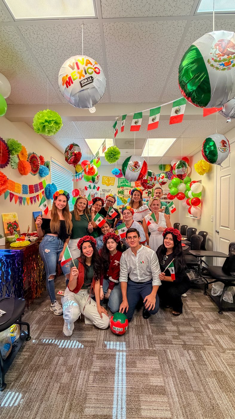 Students and staff at a cultural celebration inside the Antares Fort Myers school.
